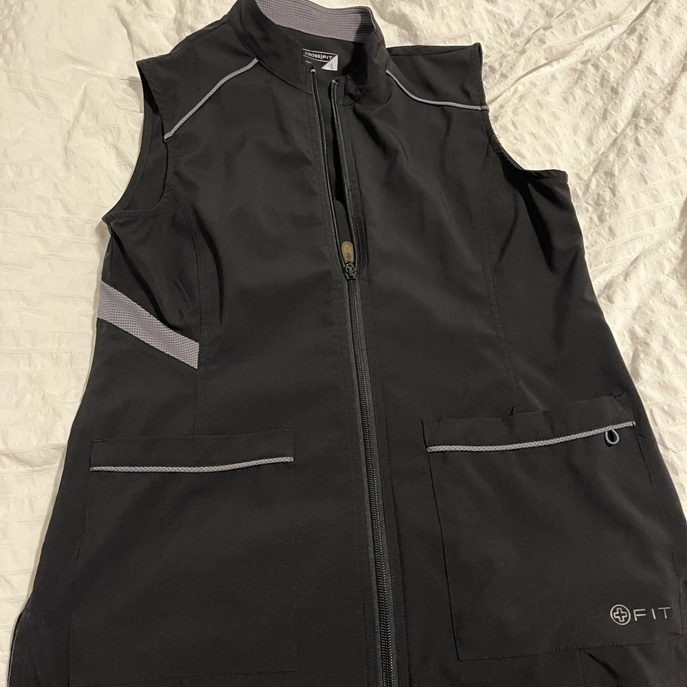 White cross scrub vest